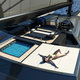 Illustration for article titled The World's Largest Sailing Trimaran Has A Garage For Your McLaren